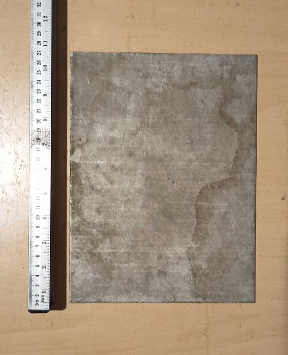 Плита 4 мм,и труба 54 мм из нержавейки.Эбонит 50 мм.Медная болванка