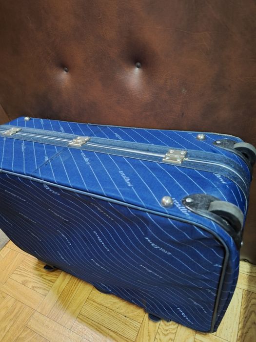Duża granatowa walizka excellens na 2 kółkach