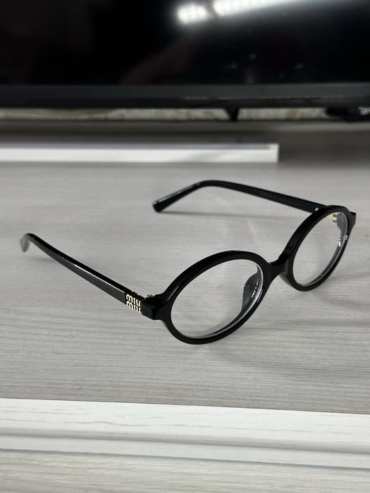 Оригінальні окуляри Miu Miu SMU04Z чорна овальна оправа Італія