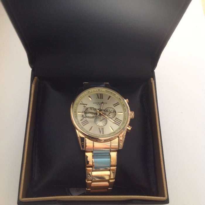 Relogio Akribos XXIV dourado novo com caixa