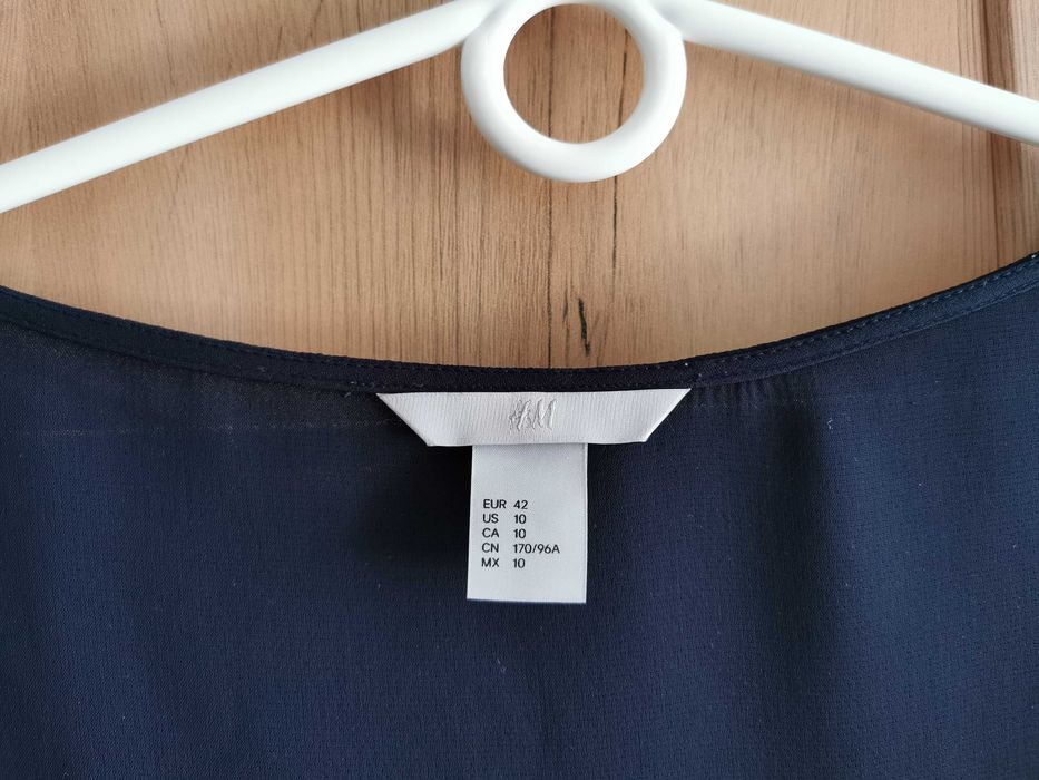 Bluzka H&M z pierzastymi rękawami