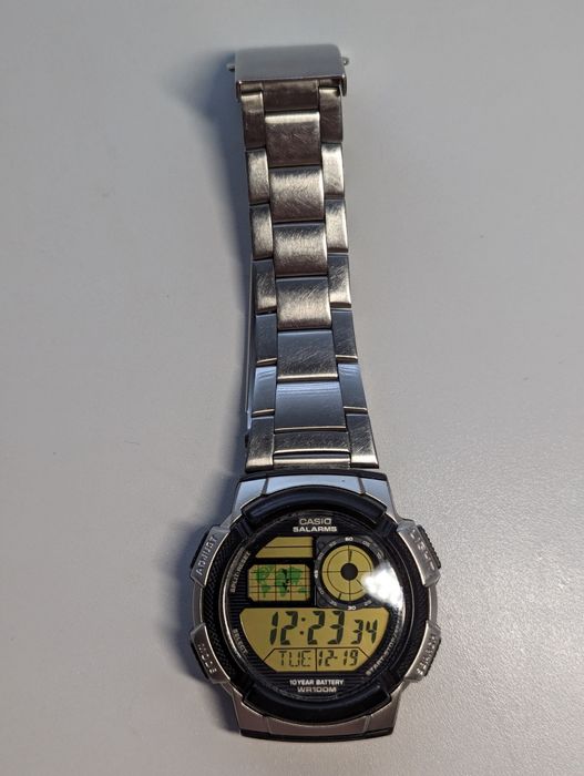 Casio AE-1000W з металевим ремінцем