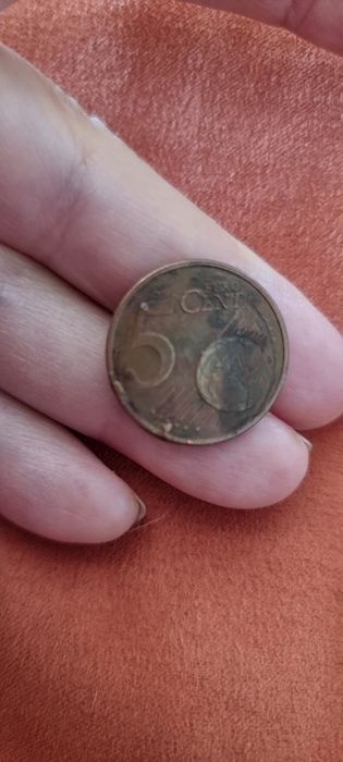 Moeda com erro de cunhagem excesso de metal