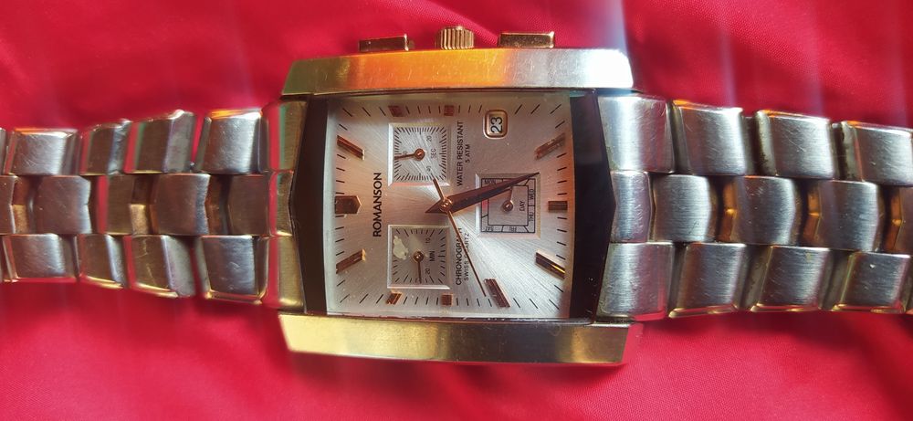 Часы Romanson.    .