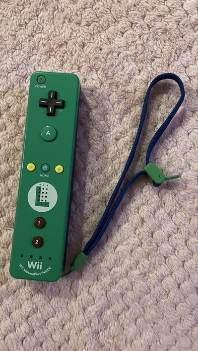 Jogo Wii Super Mario e Comando colecionavel Peach e Luigi