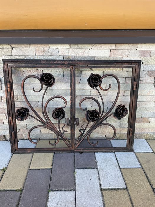 Кована камінна решітка