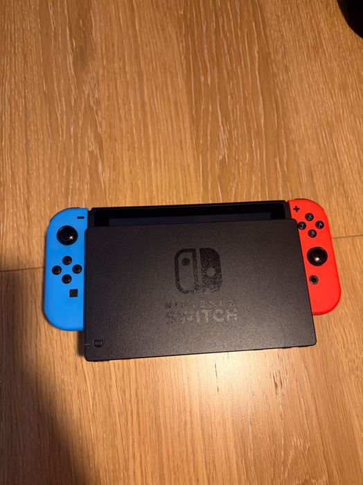Nintendo Switch Azul/Vermelho + Bolsa Animal Crossing + Grip Joy-Con + Fatura