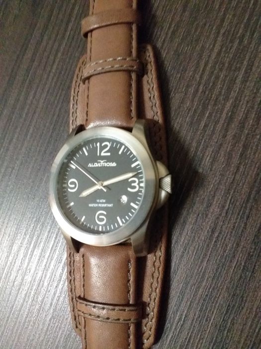 Relógio Albatross 10ATM water resistant stainless steel impecável,usado 1 vez,leva pilha nova,plástico de origem posterior,em mão veja zonas