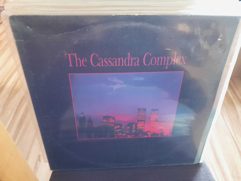 The Cassandra Complex – Theomania