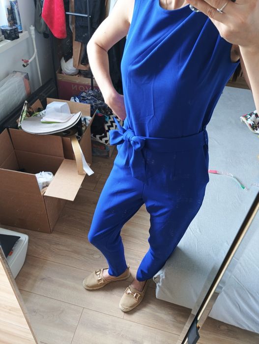 Zadbany granatowy kombinezon rozmiar S