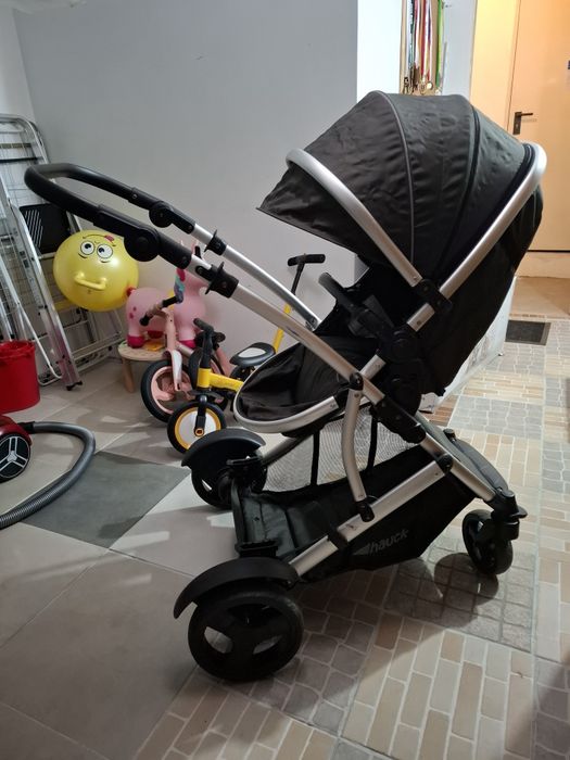 Carrinho de bebé duplo