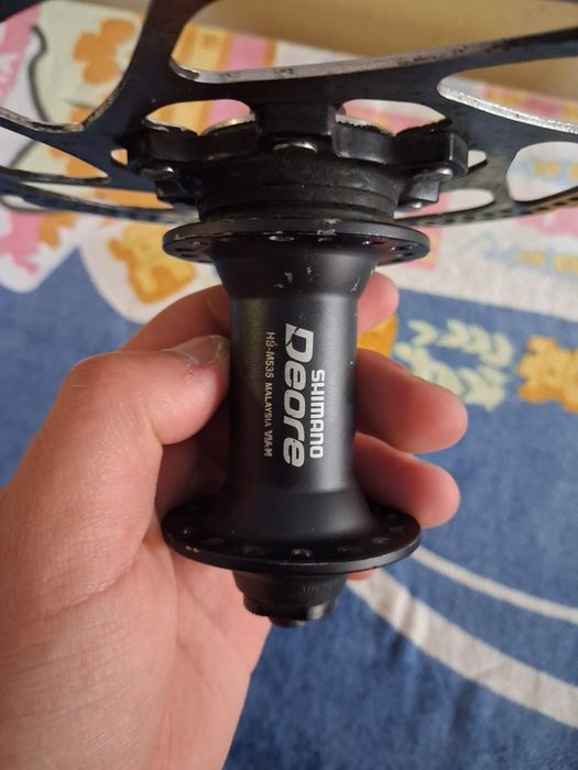 Cubo shimano deore de 32 raios e disco shimano