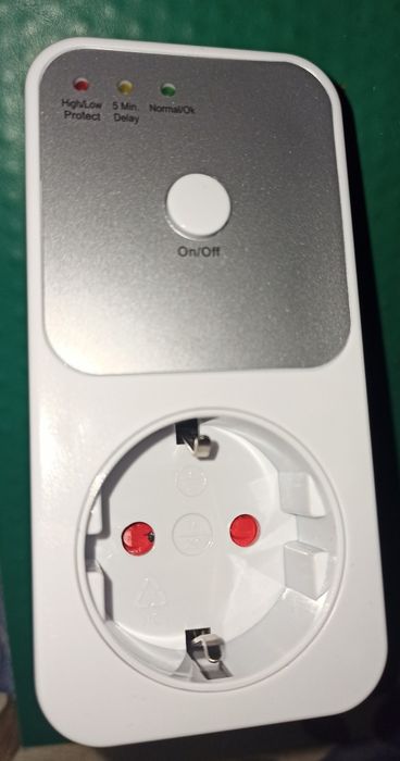 Реле напряжения в розетку HLP01 с отсрочкой старта. .