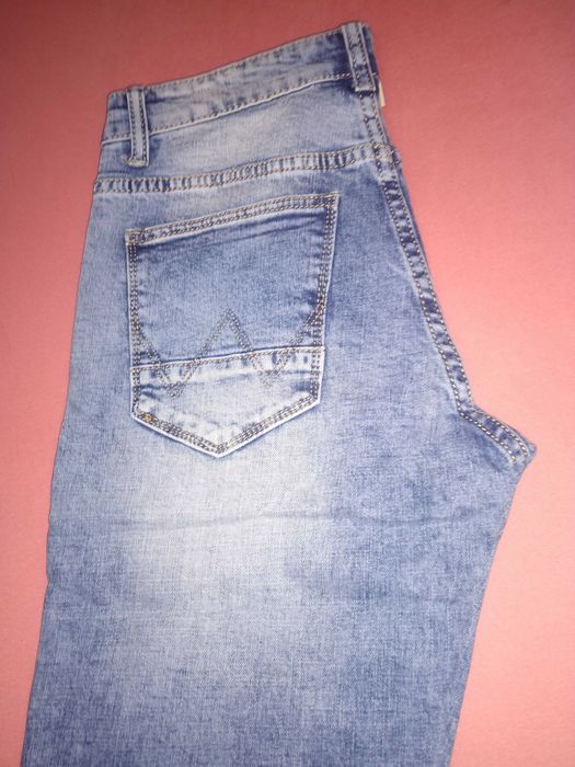 spodnie męskie jeansy jasne niebieskie  XL  37/32