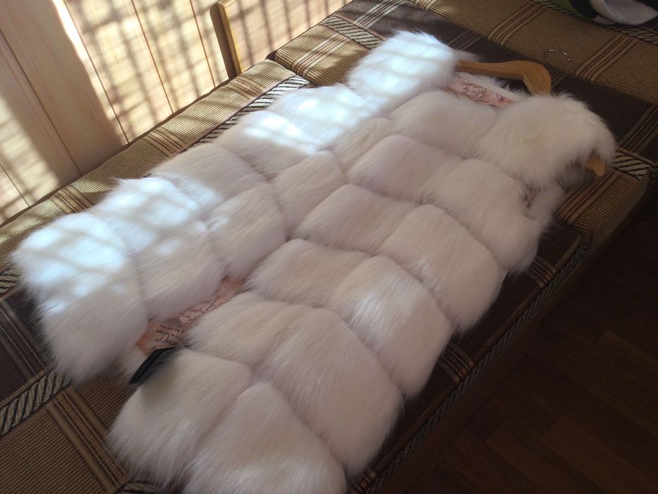 Женский меховой жилет