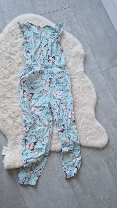 Kombinezon dziewczęcy w motyle 122/128