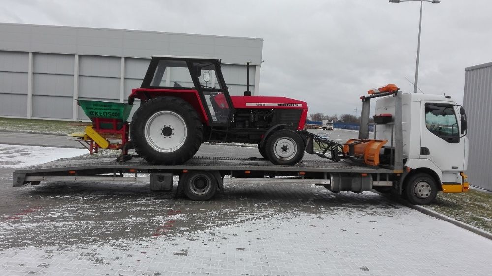 pomoc drogowa transport  laweta koparka widlak ciągnik bus przyczepa