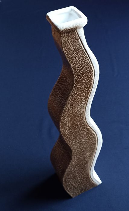 Wavy ceramic jug.64862790625026120
