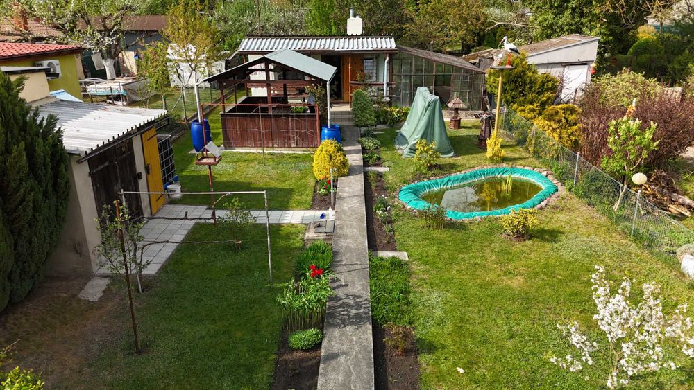 Zadbana działka ROD 400 m² z murowaną altaną i oranżerią – Gniezno