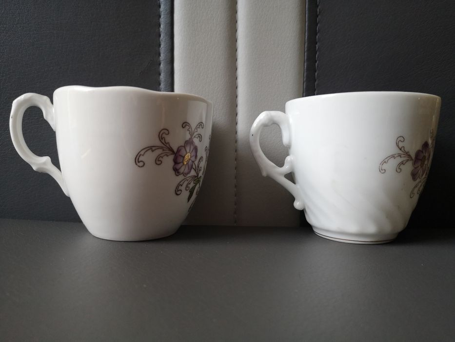Dwie stare porcelanowe filiżanki motyw kwiatów