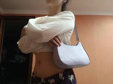 Сумка багет лилового цвета