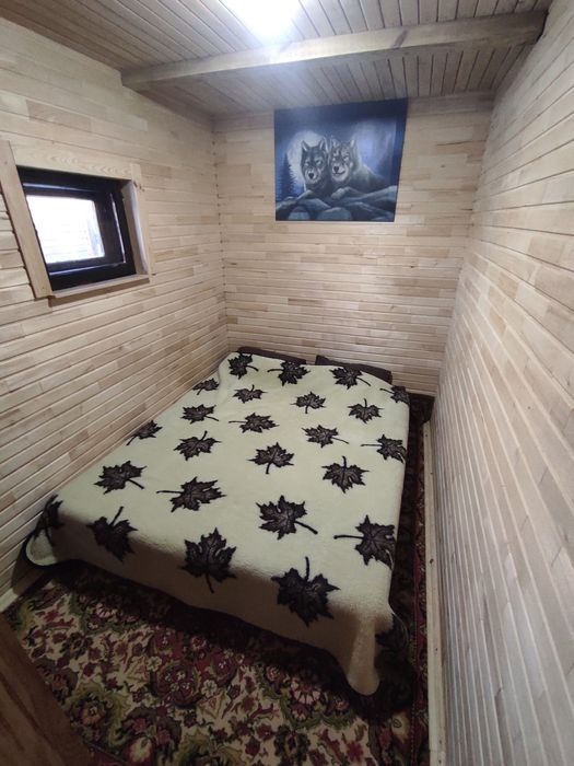 Подобово дерев'яний будинок з сауною.