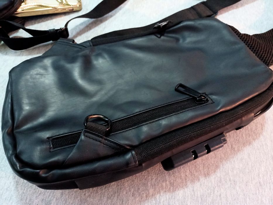 Bolsa mochila tiracolo