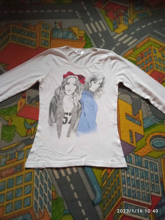 Bluzeczka z długim rękawem rozmiar  134