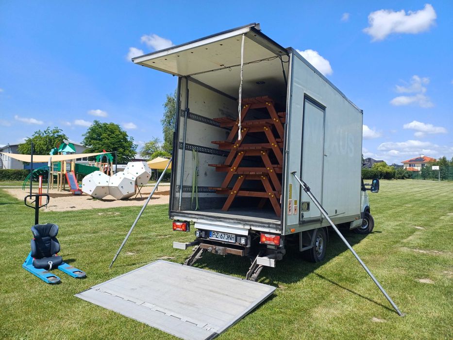 Usługi transportowe bus z windą Poznań Przewóz palet maszyn rzeczy