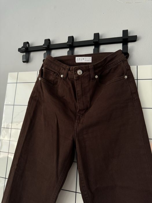 Коричневі джинси