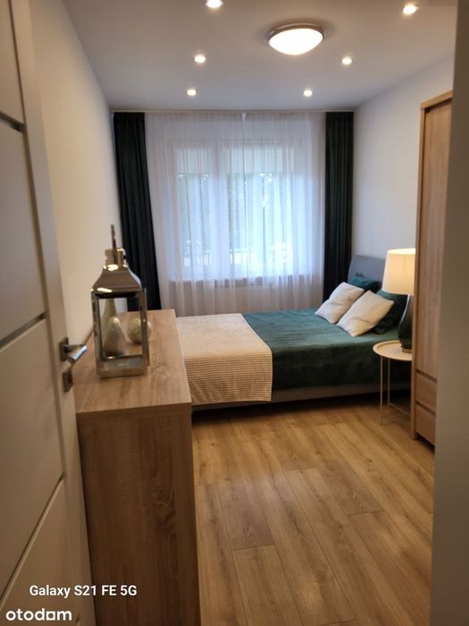 Mieszkanie 2 pokojowe na parterze z balkonem.