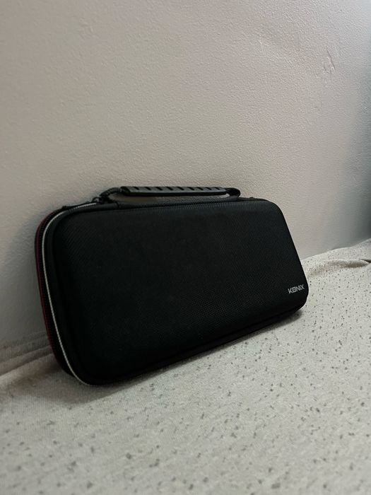 Nintendo Switch OLED + 2 gry