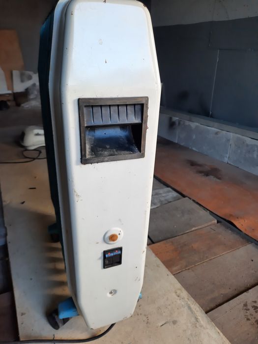 Масляный обогреватель,  рабочее состояние