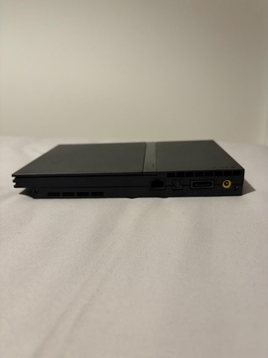 PS2 Slim com acessórios