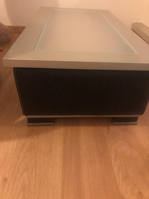 Mesa de centro com tampo elevatório