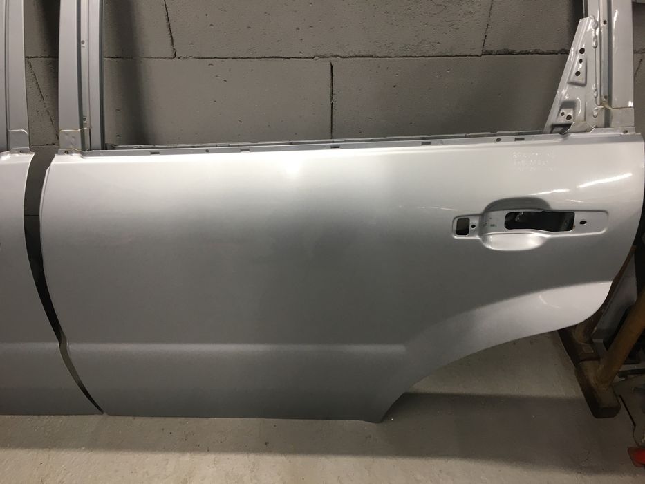 Дверь передняя задняя левая правая Ssang Yong Rexton Рекстон запчасти