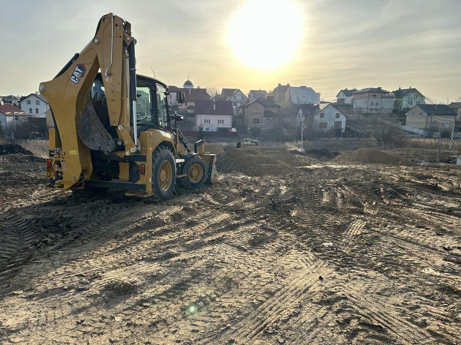 Вирівнювання ділянок підсипка засипка планування