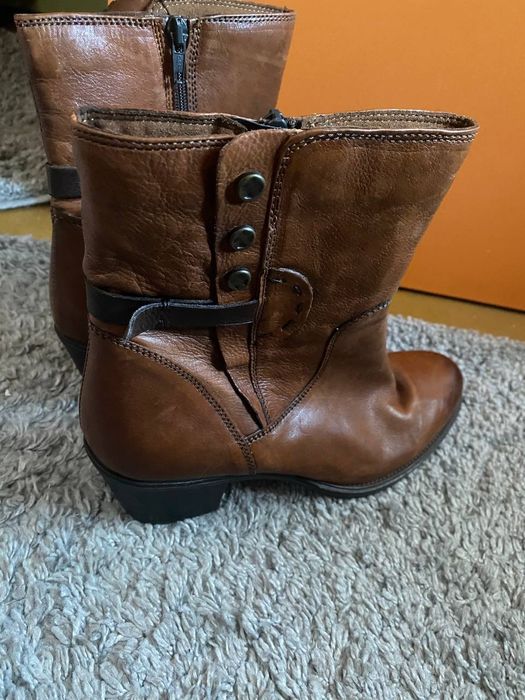 черевики Clarks.
