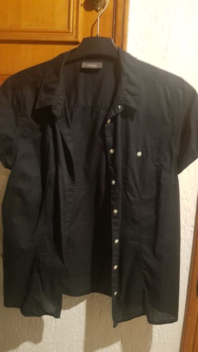 Roupa preta 2 coletes e 2 camiseiros