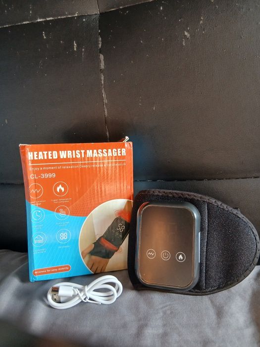 Massageador de mão vibratório com aquecimento