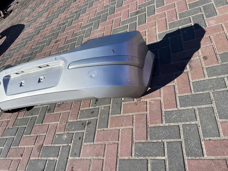 Задній бампер Опель Астра Н