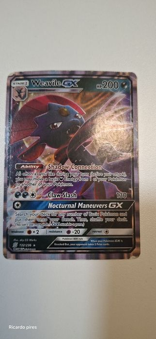 carta Weavile GX do conjunto Pokémon TCG: Sol e Lua - Sintonia Mental