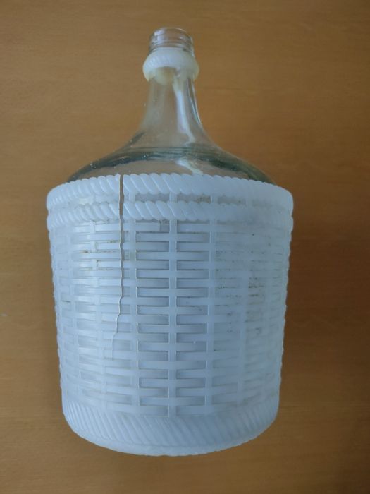 Conjunto de garrafões de vidro vintage.