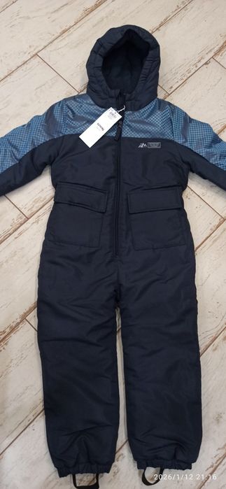 Nowy zimowy kombinezon dla chłopca 122/128