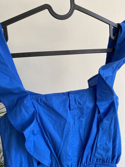 Kombinezon niebieski z falbanami M krótkie spodenki na ramiączkach H&M