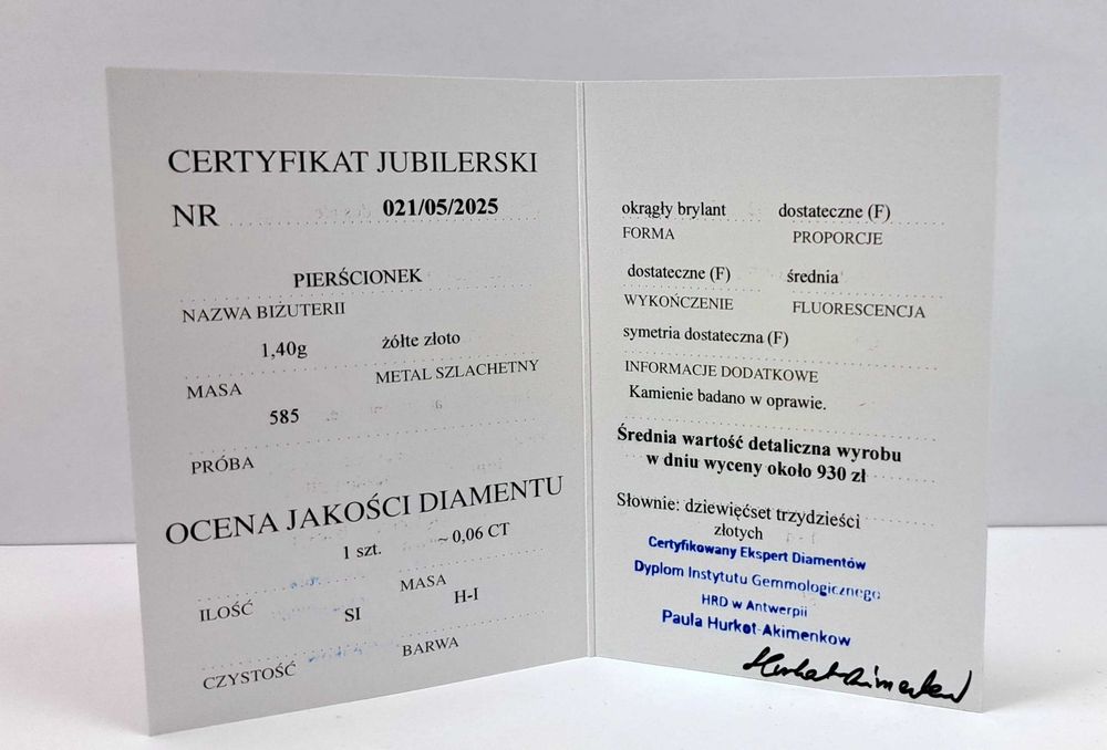 Złoty pierścionek 585 z brylantem 0,06ct w:1,40g r:12