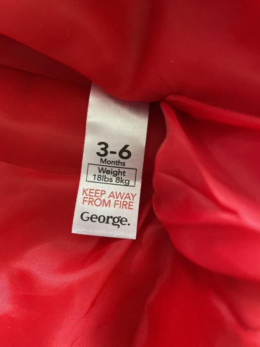 Nowy kombinezon 3-6 m
