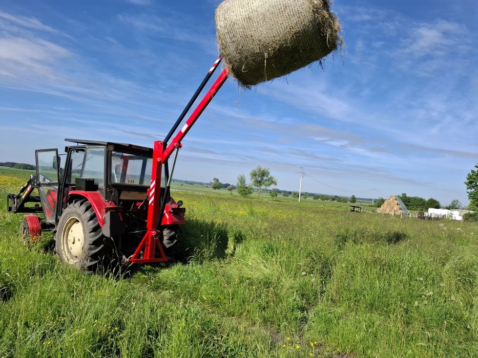 Na tył podnośnik hydrauliczny do bel z samopoziomem, ładowacz ba tylni tuz do balotów