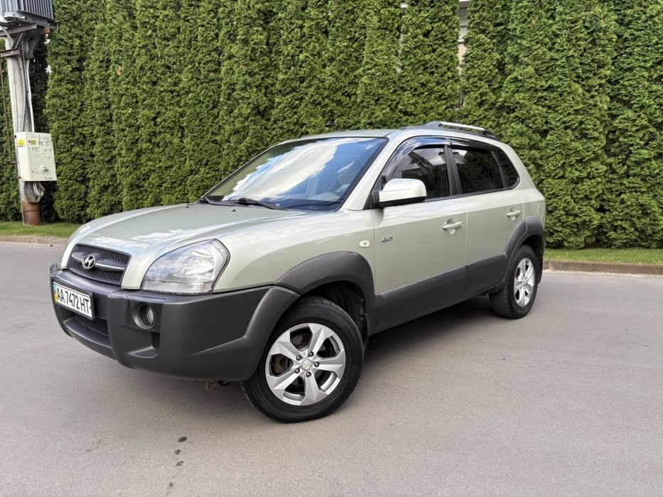 Hyundai Tucson 2006 VIN KMHJN81BP7U556111 фото оголошення 4 з 8