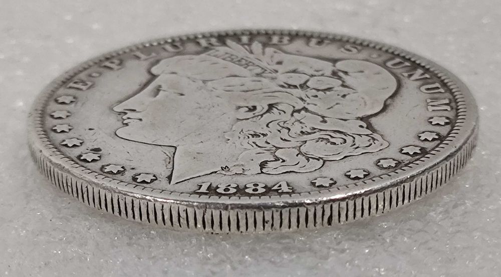 Moeda Morgan Dollar prata 1884